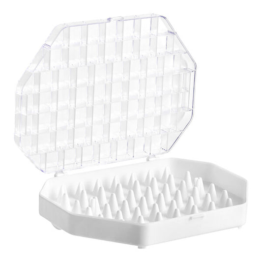 Ateco piping tip storage box open, clear hinged lid and white base with 49 raised pegs for holding small pastry tips, shown on a white background.