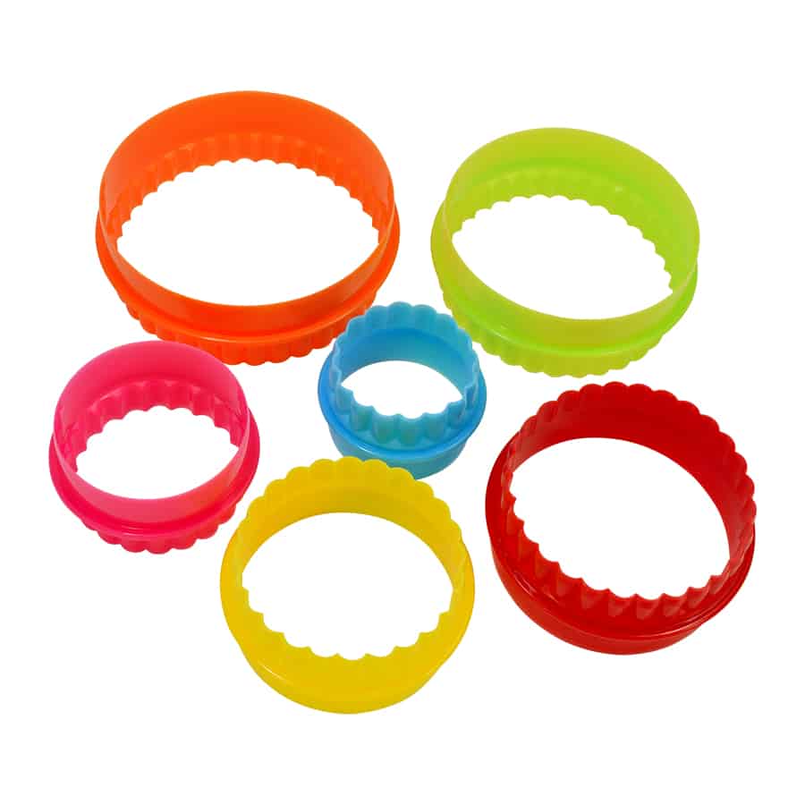 Set of 6 double-sided round cookie and biscuit cutters in bright colors, featuring smooth and fluted edges.