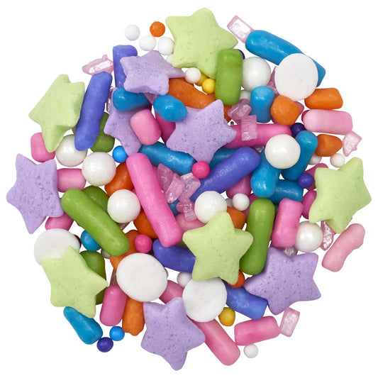 A festive mix of colorful party sprinkles including pastel star shapes, variously sized rods, and round beads in vibrant shades of purple, green, blue, pink, and white, ideal for lively dessert decorations.
