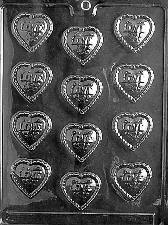FANCY LOVE HEARTS chocolate mold with embossed hearts featuring “Love” text; clear sheet.