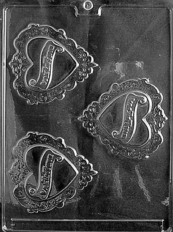 FANCY VALENTINE chocolate mold with ornate heart-shaped cavity; clear mold.