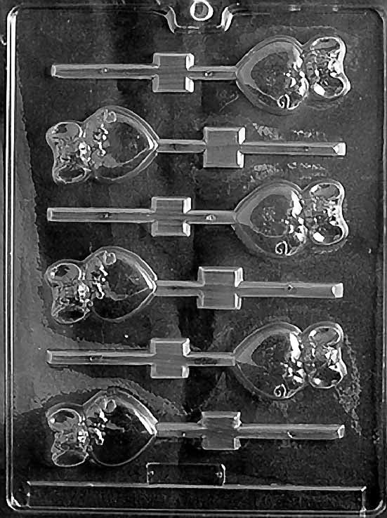 MOUSE ON HEART Lollipop chocolate mold with lollipop cavities featuring mouse and heart design; clear sheet.