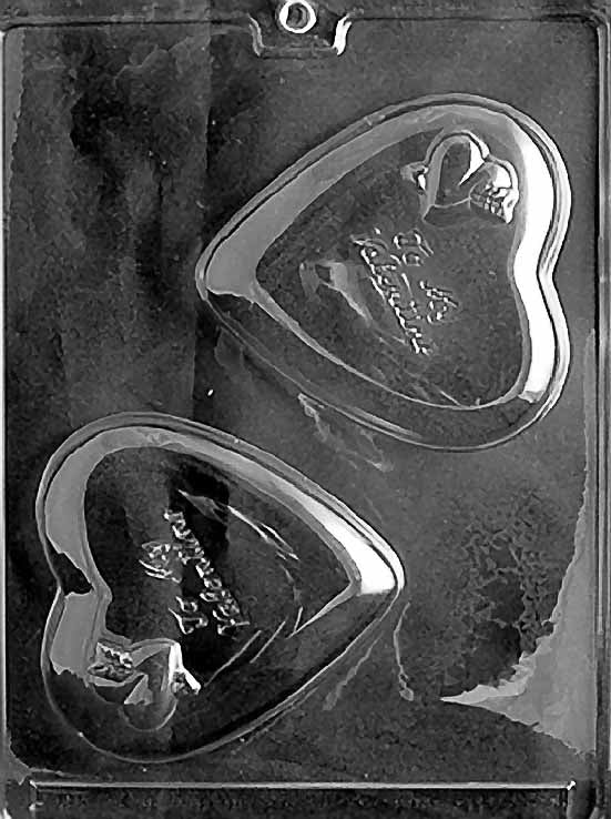 BE MY VALENTINE HEART chocolate mold with heart cavity embossed with “Be My Valentine”; clear mold.