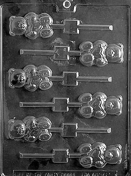 TEDDY WITH HEART Lollipop chocolate mold with teddy bear lollipop cavities holding hearts; clear mold.