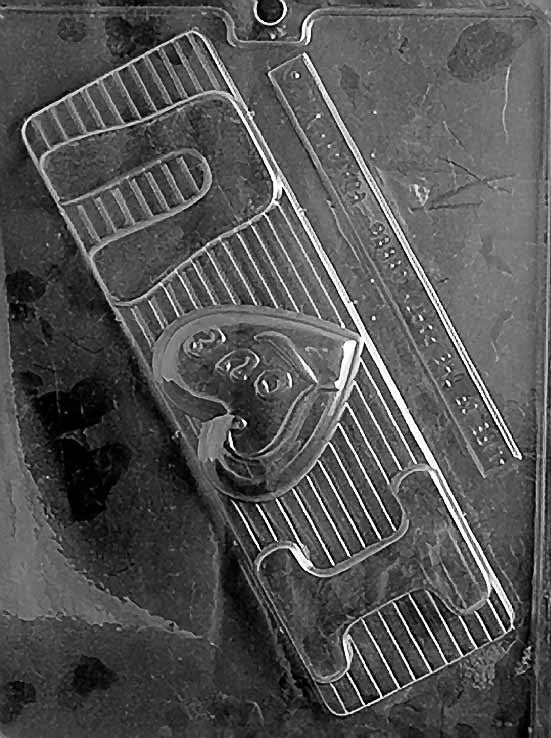 I LUV U PLAQUE chocolate mold with bold rectangular plaque embossed “I LUV U”; clear mold.