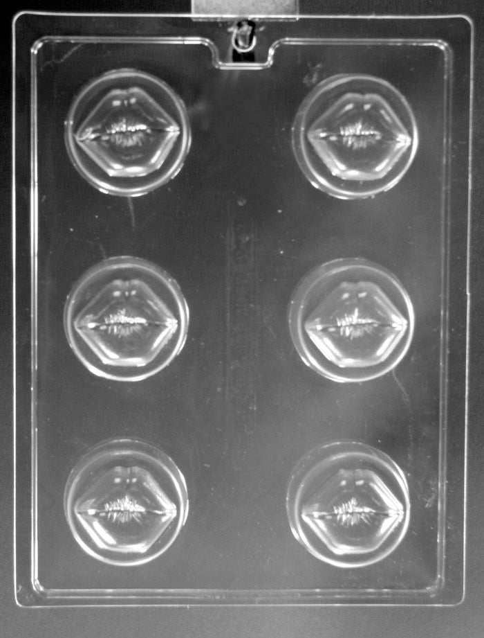 LIPS ON A COOKIE mold showing lip-shaped cavities designed to fit cookies; clear plastic mold.