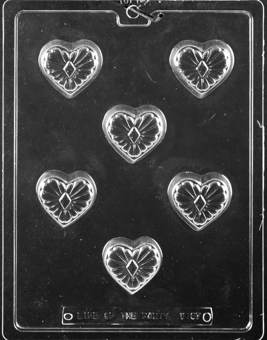 DECORATIVE HEART chocolate mold showing decorative heart cavities; clear sheet.