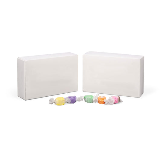 White 1 1/2 lb candy box with assorted wrapped candies, perfect for packaging and displaying chocolates or confections.