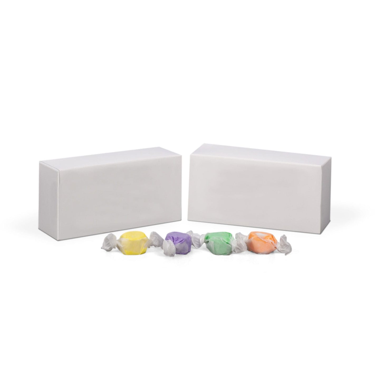 White rectangular candy boxes with colorful wrapped candies displayed in front, ideal for gifting chocolates and sweets.