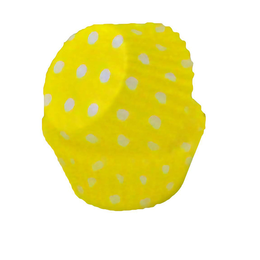 Yellow mini cupcake wrapper with white dots, side view