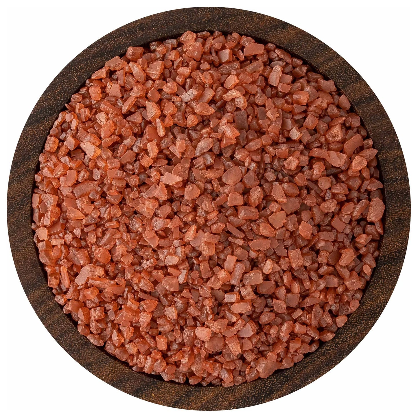 Top view of a round bowl filled with small-grain red Hawaiian-style sea salt crystals in earthy brick-red tones.