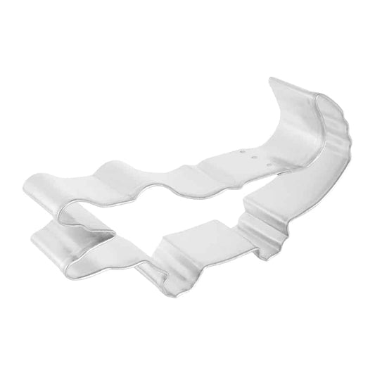 Angled side view of the alligator cookie cutter, showing its depth and sharp contours.