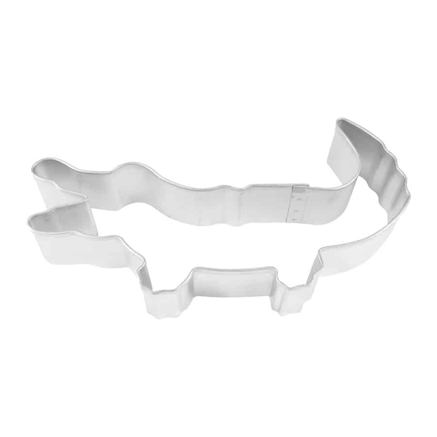 Overhead view of an alligator-shaped metal cookie cutter with detailed ridges along its back.
