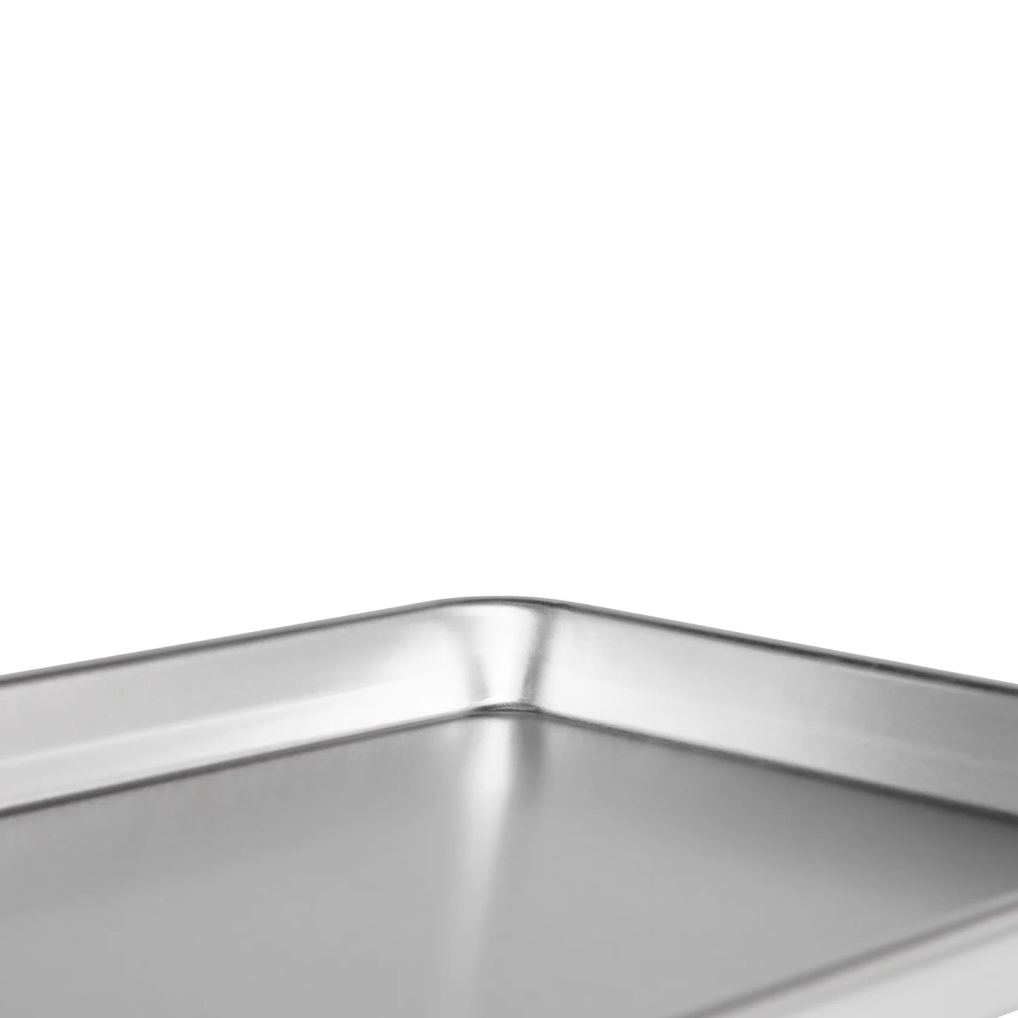 Close-up of corner detail on aluminum sheet pan, highlighting smooth finish and rolled edges