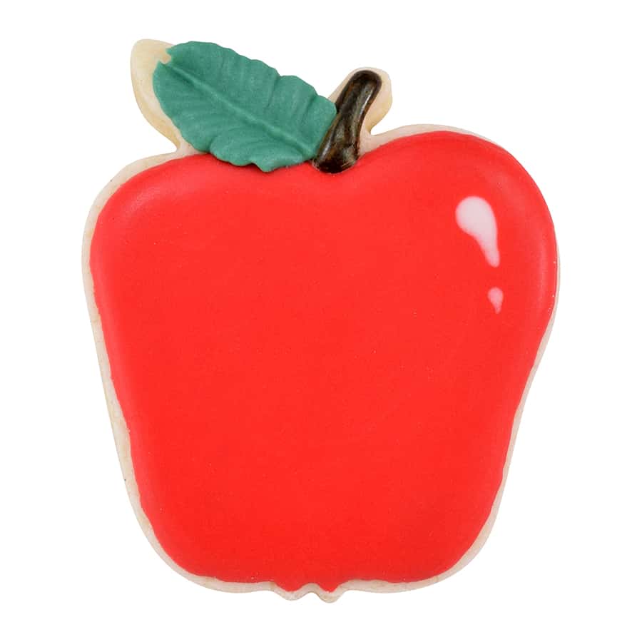 Red apple-shaped sugar cookie with a smooth icing finish, detailed with a green leaf and brown stem.