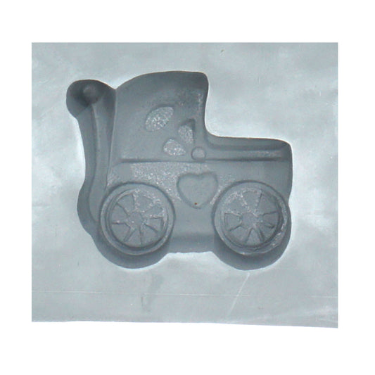 Close-up of a baby buggy-shaped cavity in a natural rubber mint mold, perfect for making themed cream cheese mints or chocolates for baby showers.
