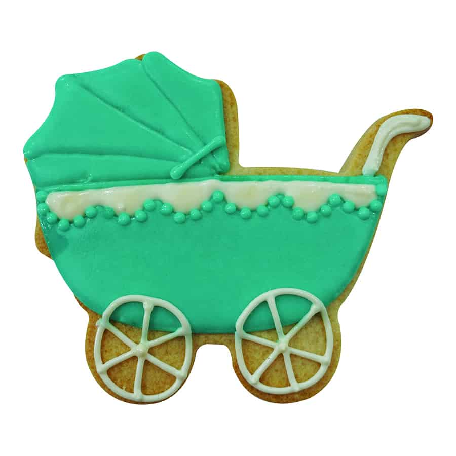 Green baby carriage cookie decorated with white piping and delicate icing accents.