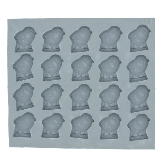 Full sheet of 20 baby chick-shaped cavities in a natural rubber mold used for creating Easter or baby shower treats like mints or molded candy.