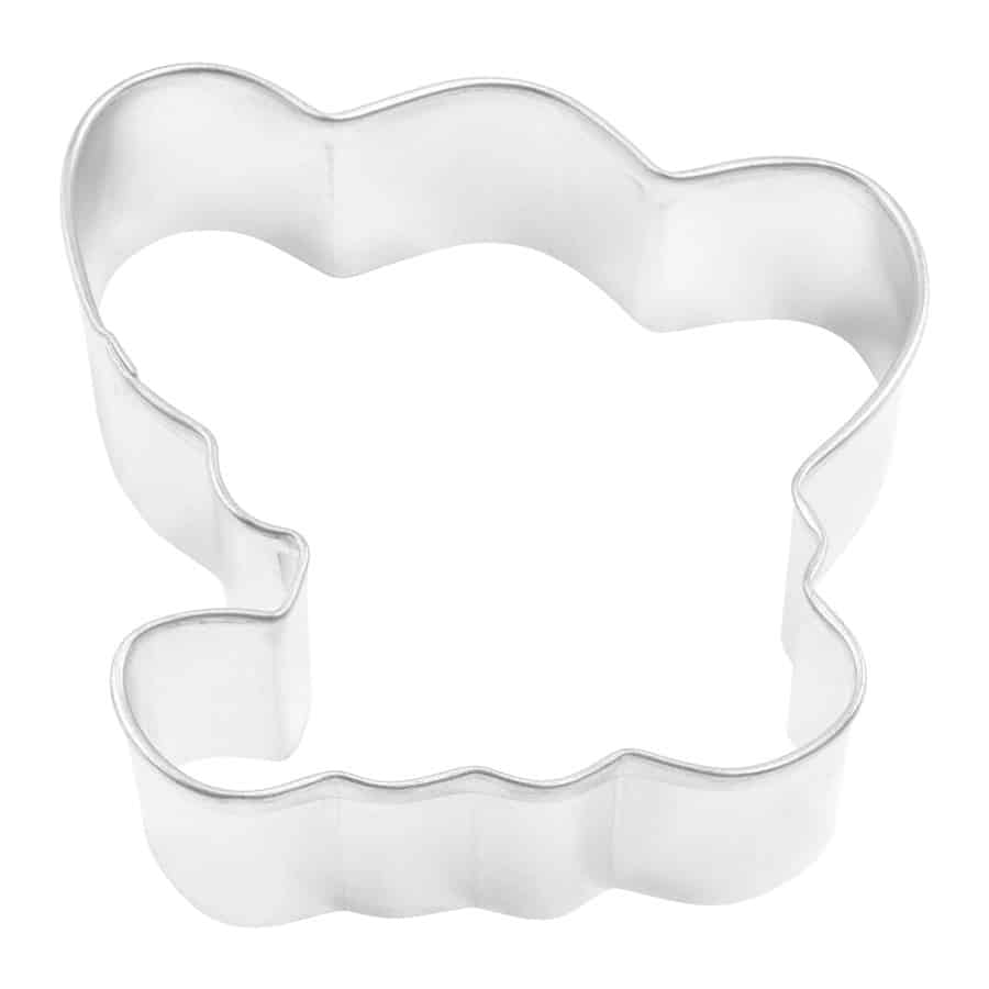 A metal baby elephant-shaped cookie cutter with a rounded head, large ears, and a sitting posture, lying flat on a white background.
