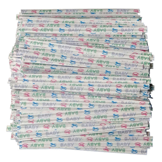 Stack of paper twist ties with pastel baby shower designs featuring blue, pink, and green baby icons and "BABY" text, perfect for treat or favor bags.