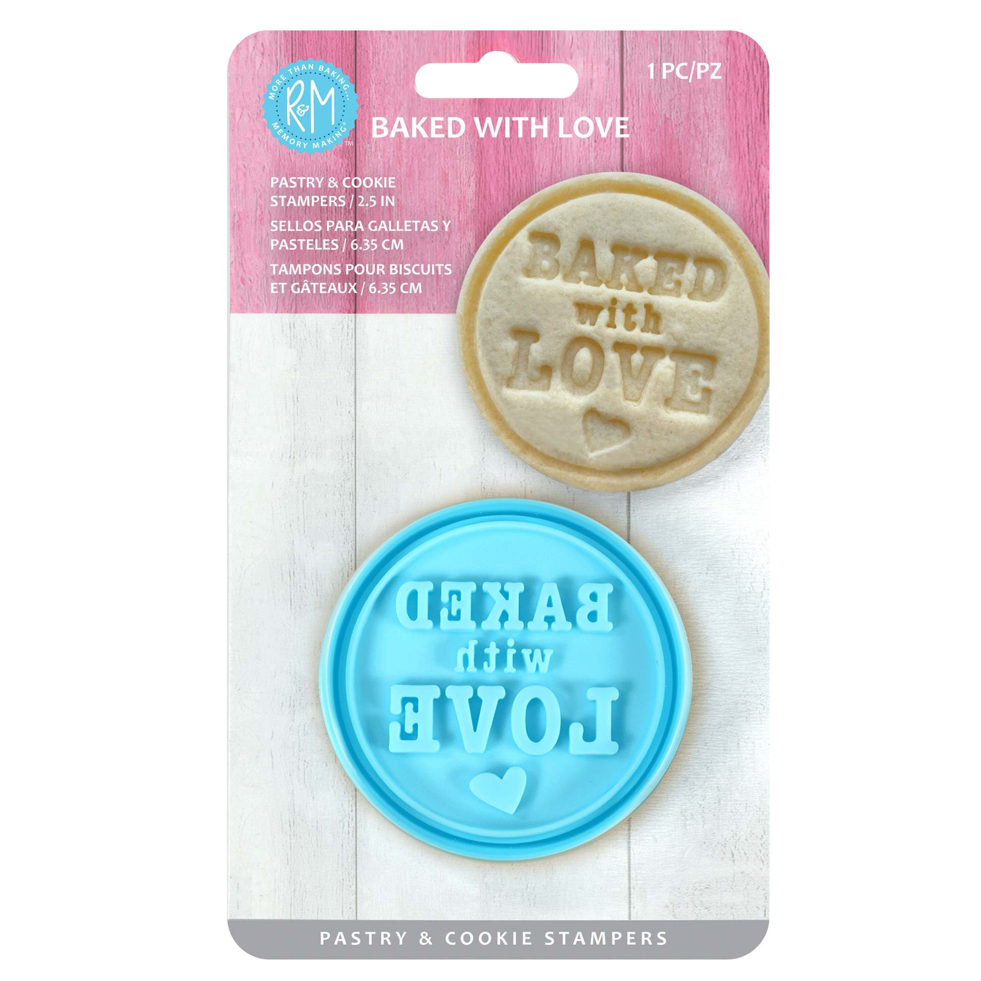 "Baked with Love" pastry and cookie stamper in retail packaging, featuring a blue plastic stamp and an embossed cookie.