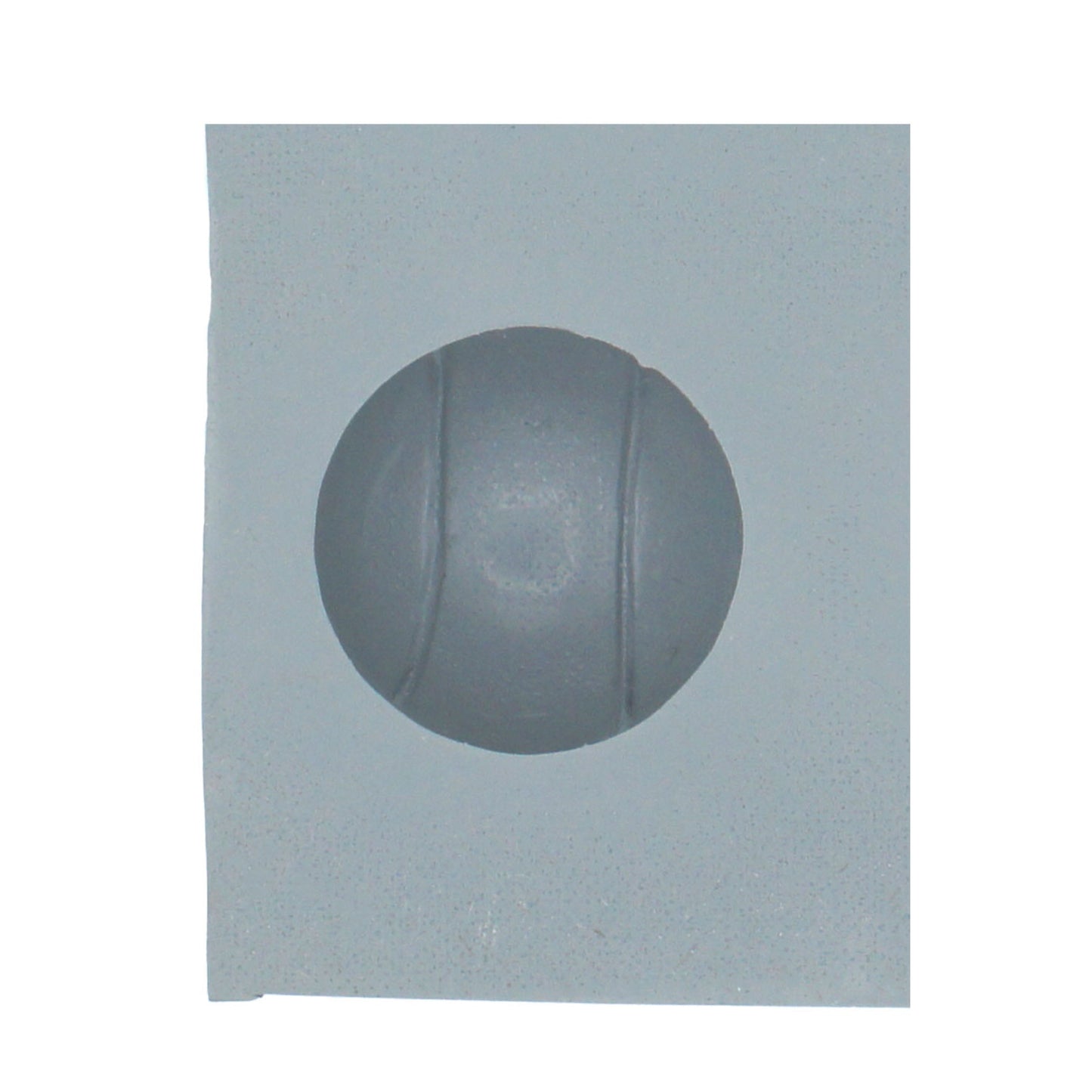 Close-up of a sports ball-shaped cavity in a natural rubber mint mold, ideal for making cream cheese mints, chocolates, or sports-themed confections.