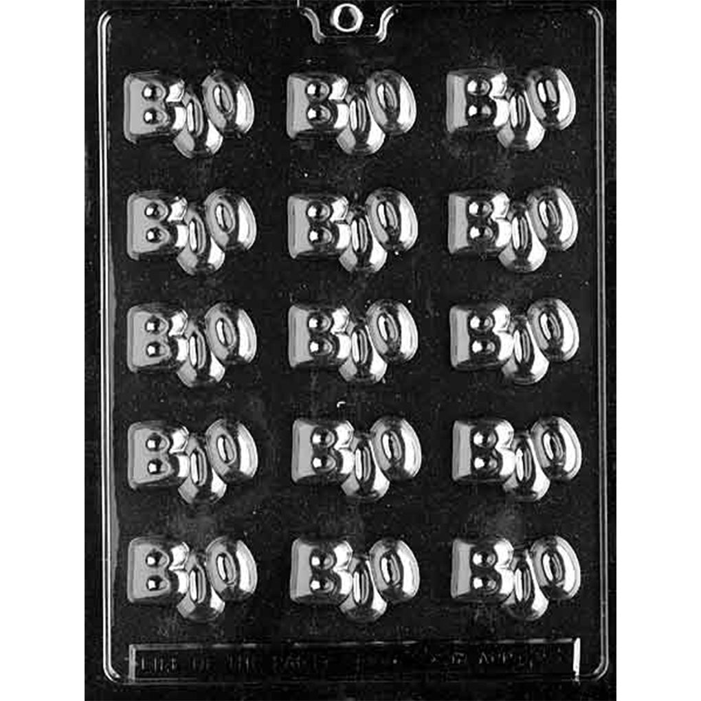 Clear plastic chocolate mold with twelve small cavities shaped like the word “BOO” in raised lettering, arranged in a grid.