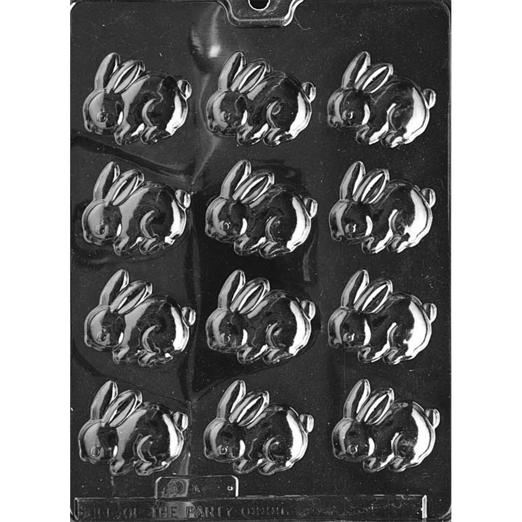 Clear plastic chocolate mold with multiple small cottontail bunny cavities arranged in rows.