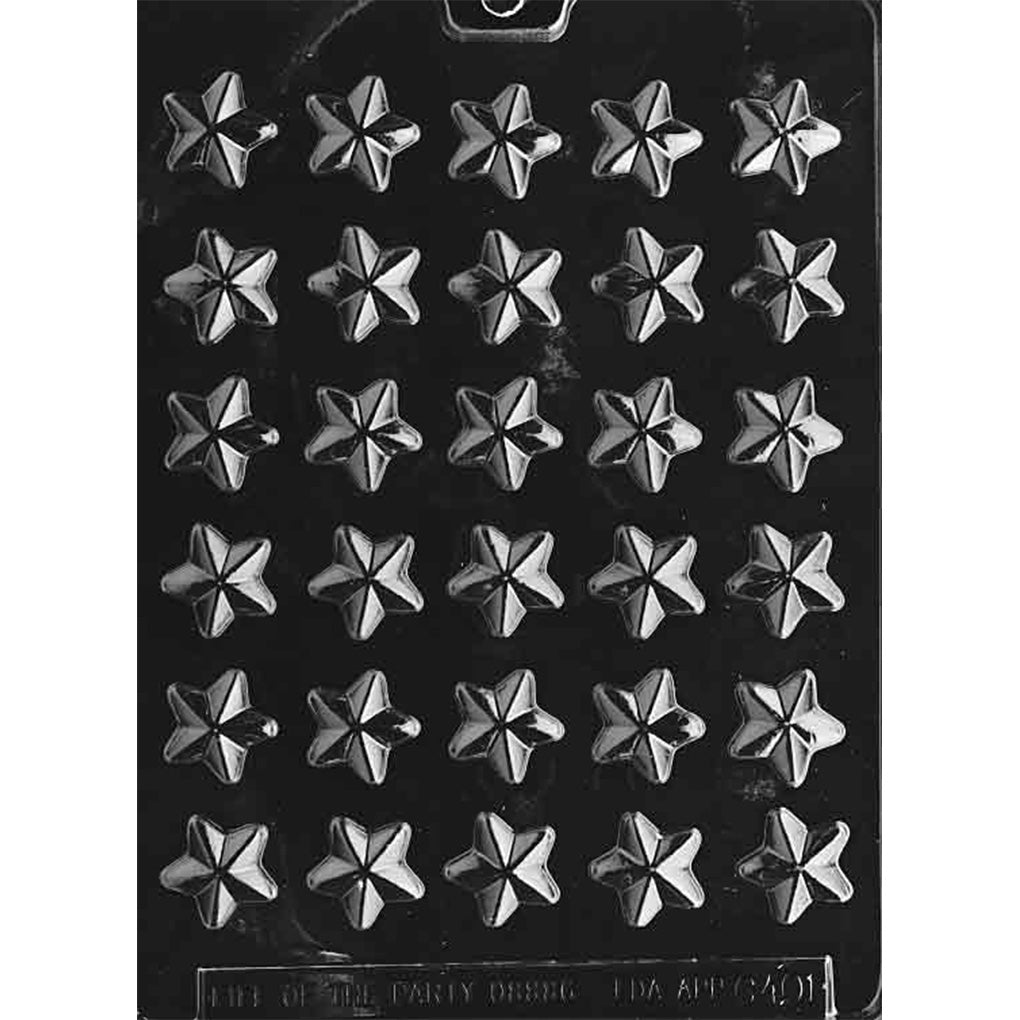 Clear plastic chocolate mold with thirty bite-sized star cavities, each with faceted five-point star details, shown on a dark background.