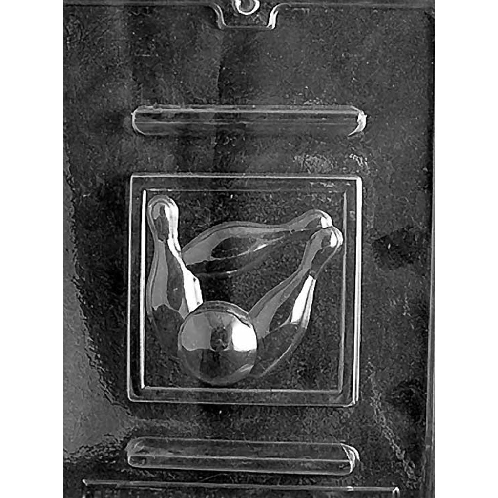 Plastic chocolate mold cavity showing a bowling ball striking a cluster of bowling pins in one square plaque design.