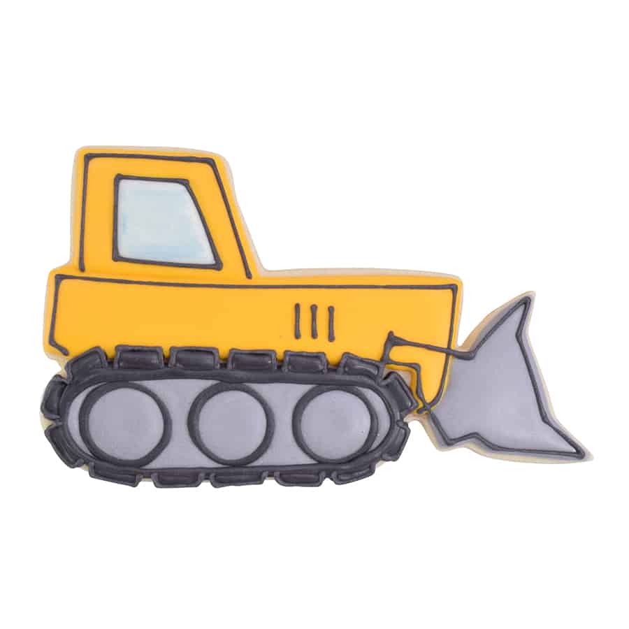 Decorated bulldozer-shaped cookie with yellow, black, and gray icing details.