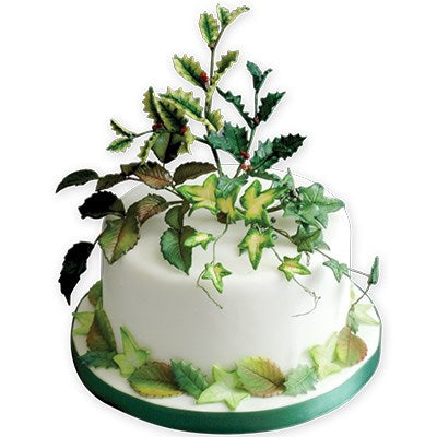 Cake decorated with realistic sugar ivy leaves and other foliage details