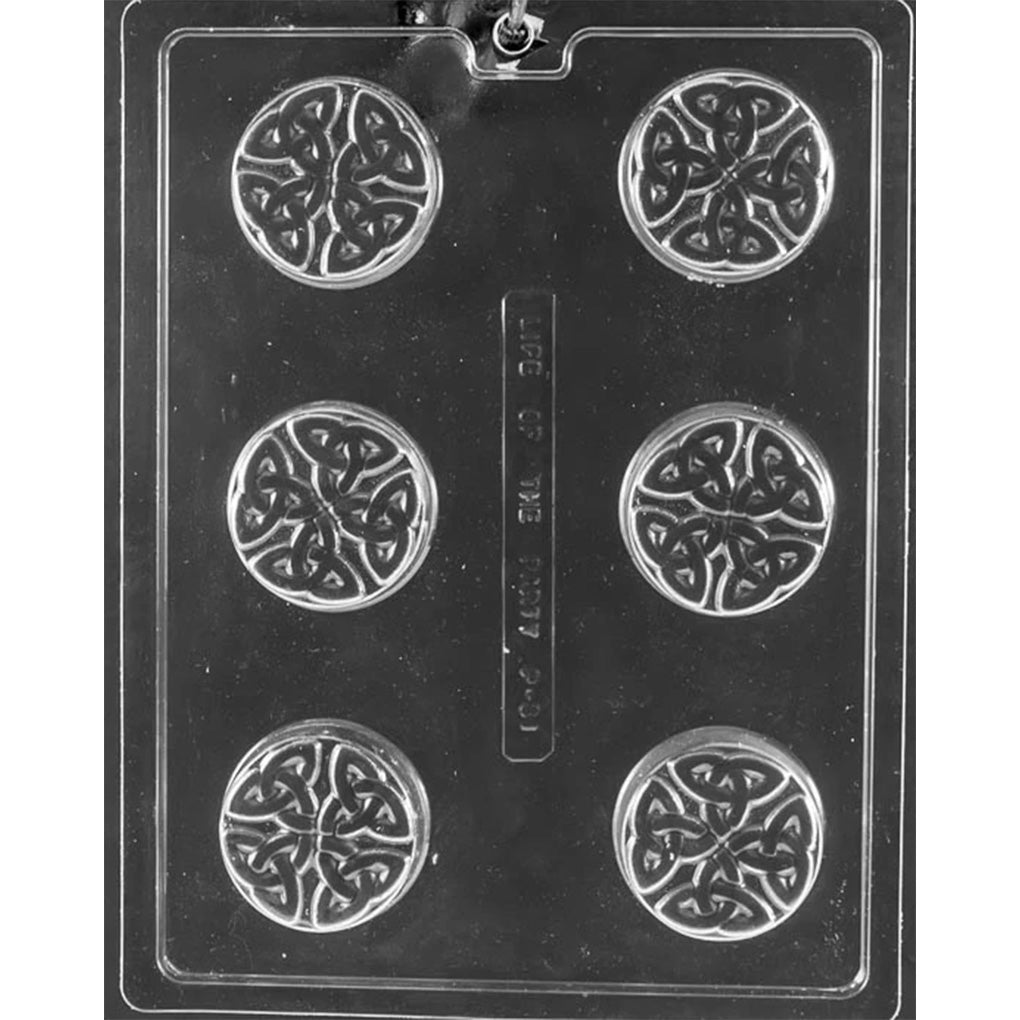 Celtic cookie chocolate mold with six round cookie-sized cavities, each embossed with an intricate Celtic knot pattern, shown in clear plastic.