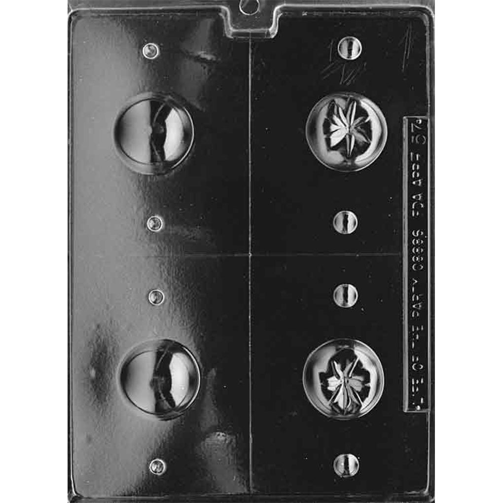 Clear Miniature 3D Tomato Chocolate Mold photographed against a black background with two detailed tomato front cavities and two smooth matching back halves for making complete 3D cherry tomato chocolates.