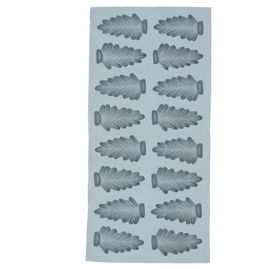 Full sheet of Christmas tree rubber mint molds with 16 cavities for festive treat crafting