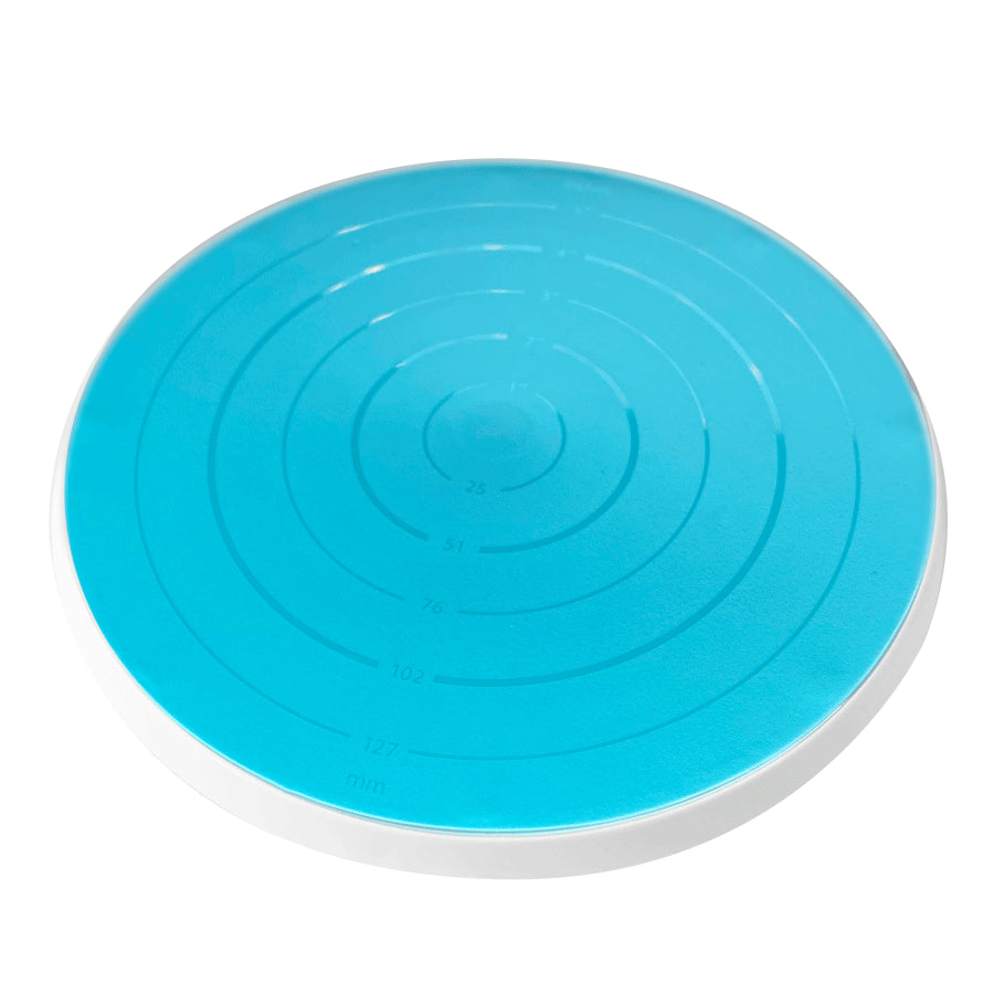 Close-up of the blue Cookie Turntable with measurement markings.
