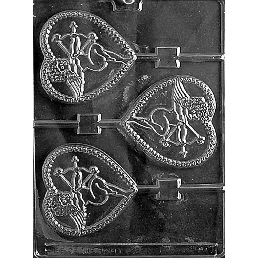 Clear plastic chocolate lollipop mold with three heart-shaped cavities featuring an embossed Cupid archer with bow and arrow inside a beaded heart border, each cavity connected to a stick channel.
