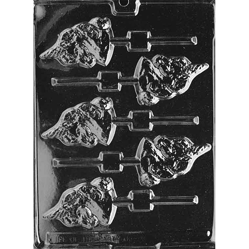 Clear plastic unicorn head chocolate lollipop mold with six unicorn profile cavities showing a pointed horn and flowing mane, each with a stick channel, on a dark background.