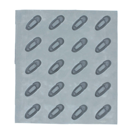 Full sheet of 20 diaper pin-shaped cavities in a natural rubber mold, perfect for baby shower treats and crafts.
