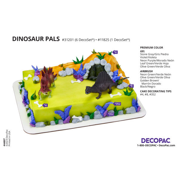 Decorated sheet cake with labeling for DecoPac's Dinosaur Pals set, featuring decorating tips and color codes.