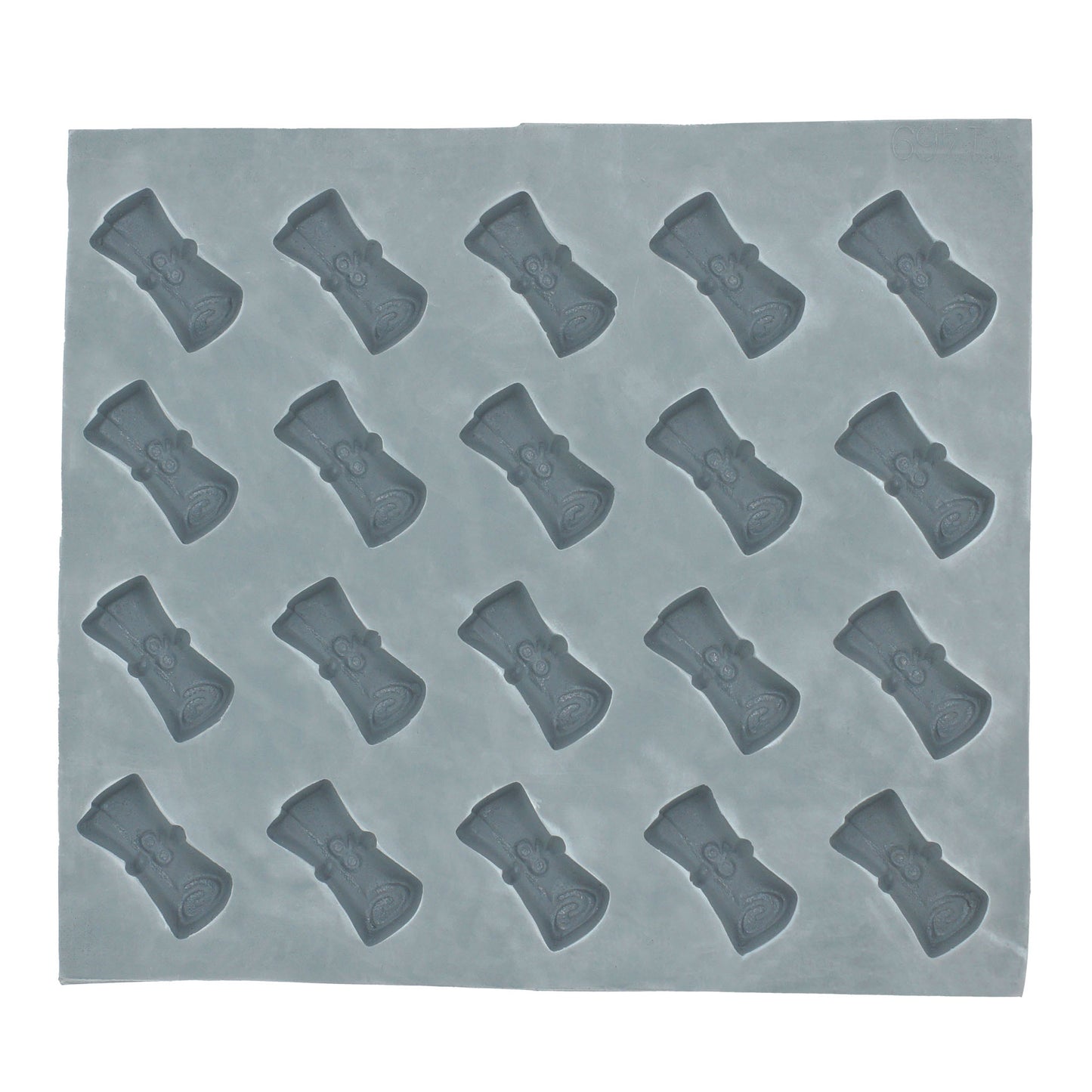 Full sheet of 20 diploma-shaped cavities in a rubber mold used for creating themed cream cheese mints or candy decorations for graduation celebrations.