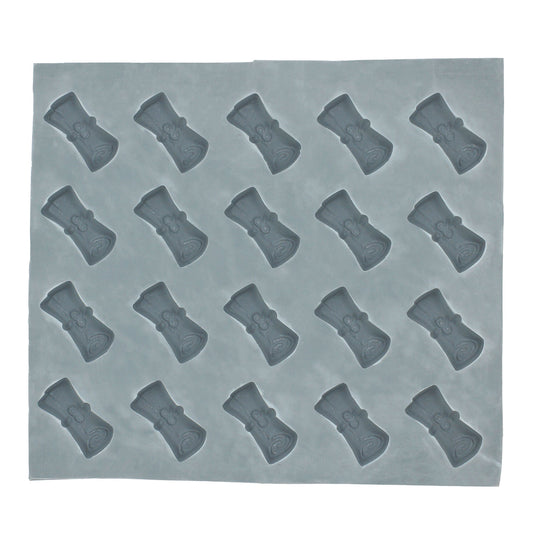 Full sheet of 20 diploma-shaped cavities in a rubber mold used for creating themed cream cheese mints or candy decorations for graduation celebrations.