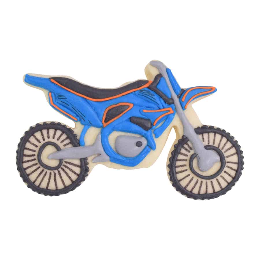 Decorated dirtbike-shaped cookie with blue, black, and orange icing details.