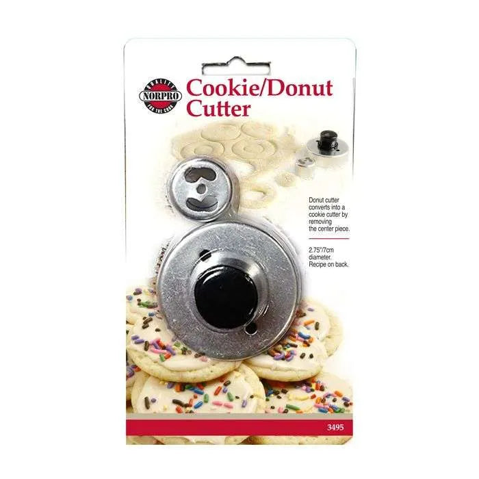Packaged cookie/donut cutter set by Norpro, includes metal cutter and dough.