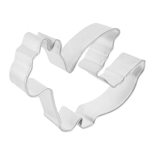 Angled side view of the dragon cookie cutter, showing its detailed wing and tail design.