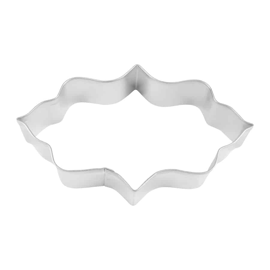 Elongated Plaque Cookie Cutter with a decorative wavy border, made of tinplated steel.