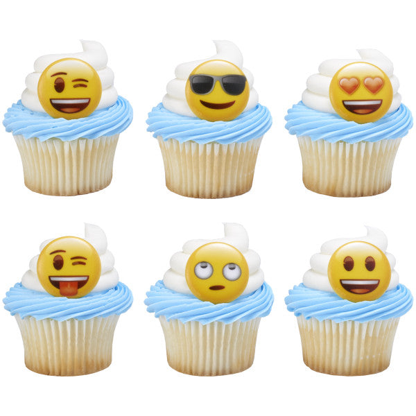 Blue and white frosted cupcakes decorated with playful emoji rings, showing a mix of facial expressions and moods.