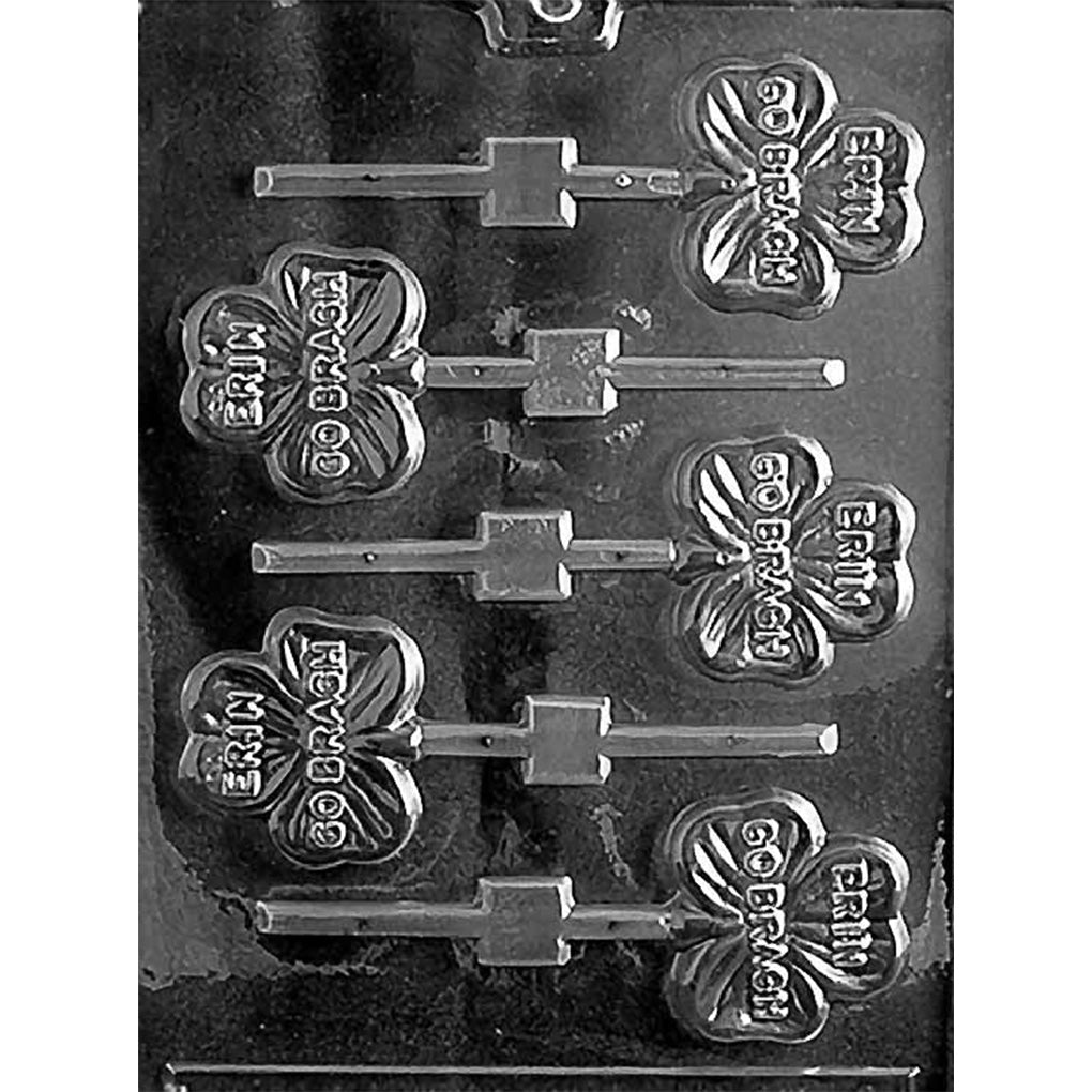 Erin Go Bragh shamrock chocolate lollipop mold with five shamrock-shaped cavities, each embossed with the words “Erin Go Bragh,” plus lollipop stick channels, shown in clear plastic.