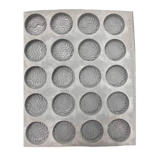 Full sheet of Fancy Mint #1 rubber mint molds with 20 round cavities, each embossed with a zigzag design.