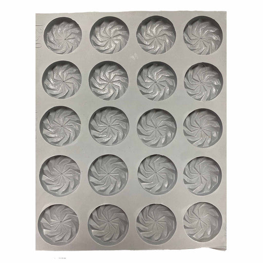 Full sheet of Fancy Mint #2 rubber mint molds with multiple circular cavities showcasing an embossed spiral pattern.